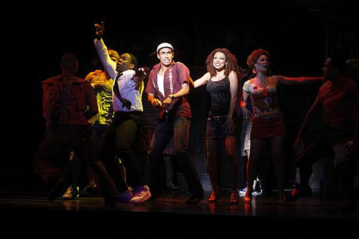 Kyle Beltran (center) performs as the character Usnavi during the first act of "In the Heights" at the Curran Theatre on Wednesday May 12, 2010 in San Francisco, Calif.