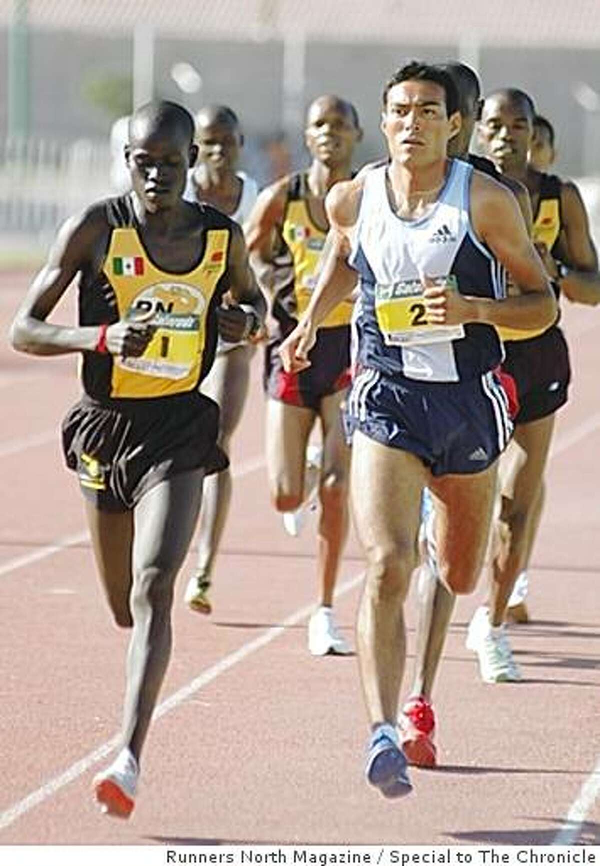 Kenyan and Mexican runners competing at a 5- kilometer race in Torreon, Mexico in 2005.