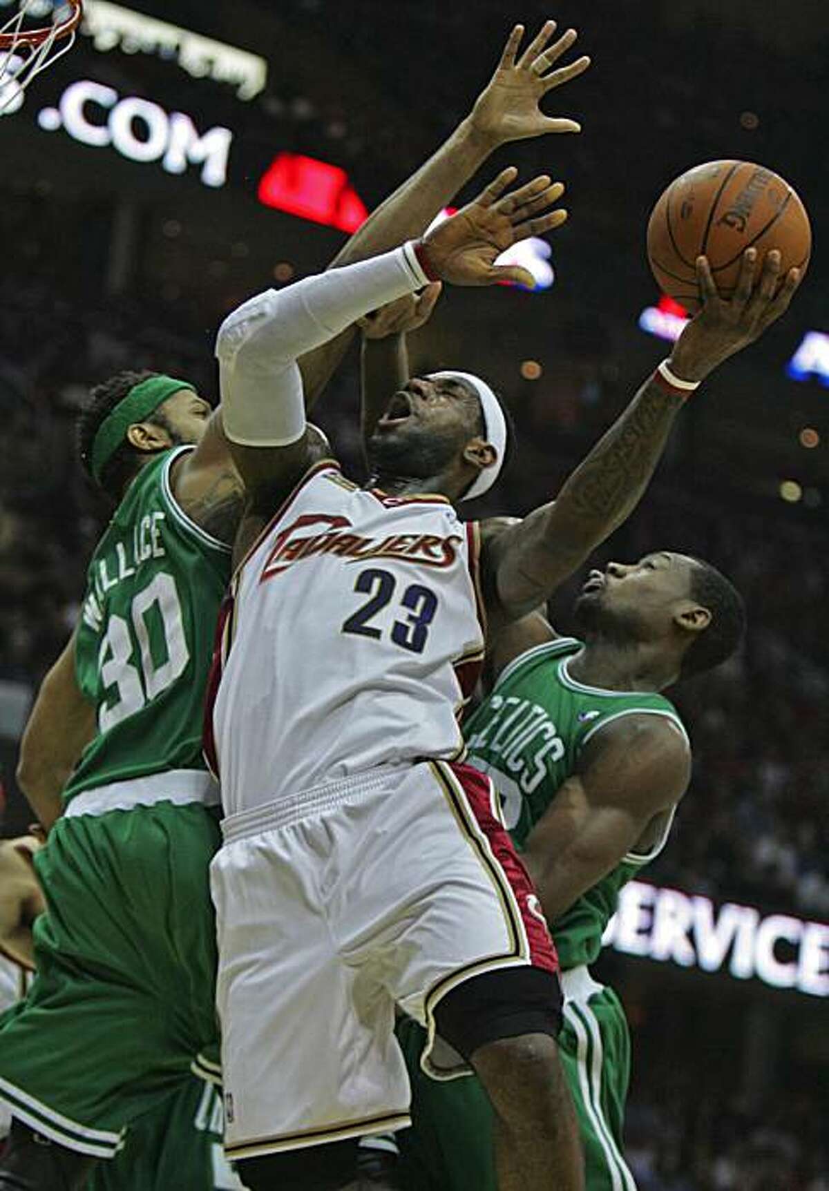 Cleveland Cavaliers' LeBron James (23) drives to the basket between Boston Celtics' Rasheed Wallace (30) and Tony Allen during first-half action in the opening game of their second-round NBA Eastern Conference playoff series at Quicken Loans Arena in Cleveland, Ohio, on Saturday, May 1, 2010. (Ed Suba Jr./Akron Beacon Journal/MCT)