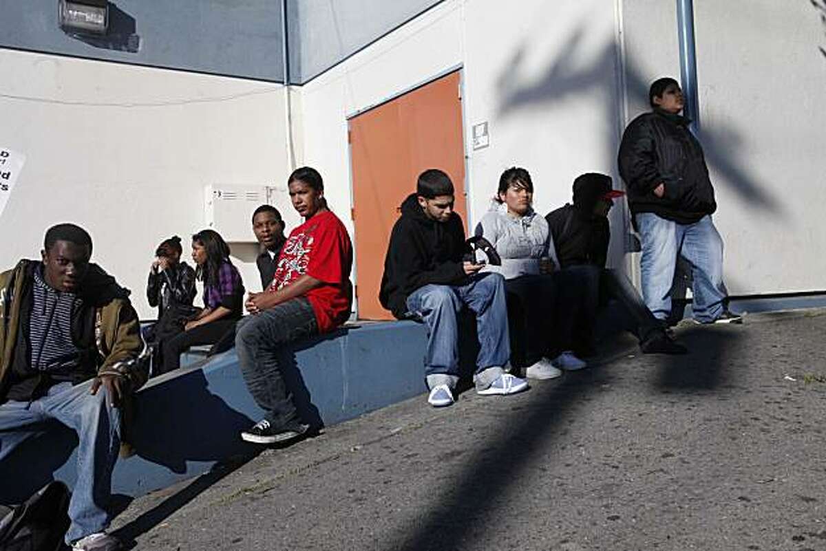 Oakland High School students sit and watch as their teachers picket during a one day strike at all Oakland Unified Schools on Thursday April 29, 2010. The union urged parents to keep their children home for the day in support of the strike but school administrators brought in substitutes in an effort to take care of the students who showed for class.