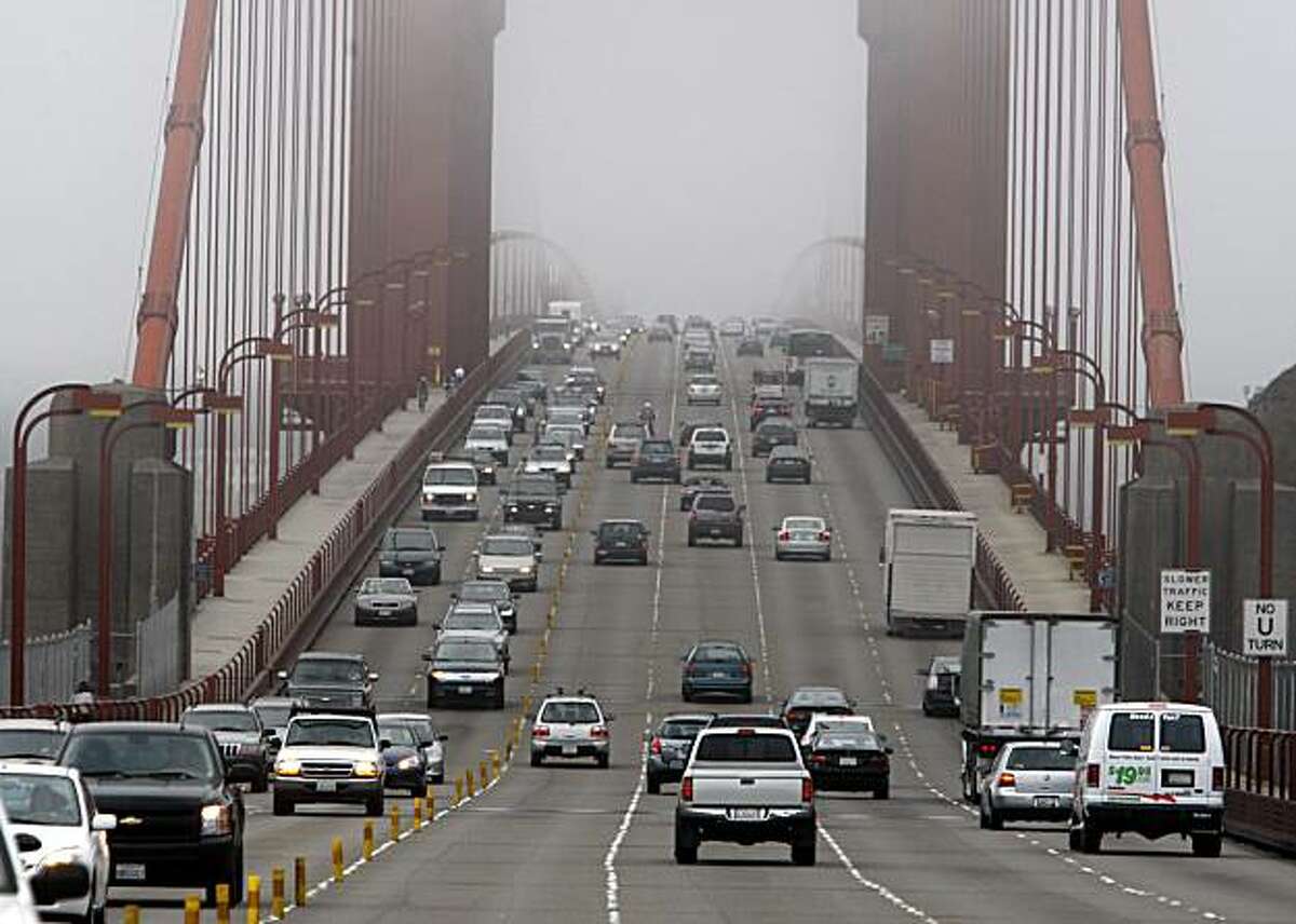 Southbound traffic (right) flows at the speed limit across the Golden Gate Bridge in Sausalito, Calif., on Friday, Sept. 4, 2009, the first full day the Bay Bridge is shut down to replace a section of the eastern span.