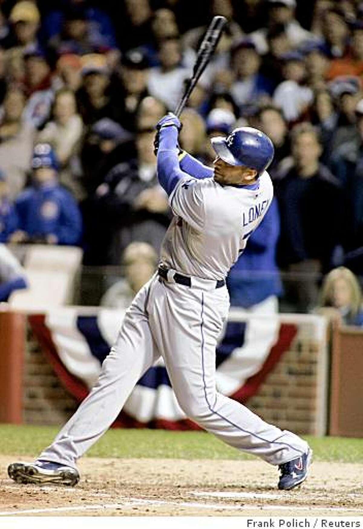 James Loney of the Los Angeles Dodgers watches his grand slam home run in the fifth inning against the Chicago Cubs during Game 1 of their MLB National League Divisional Series playoff baseball game in Chicago, October 1, 2008. REUTERS/Frank Polich (UNITED STATES)