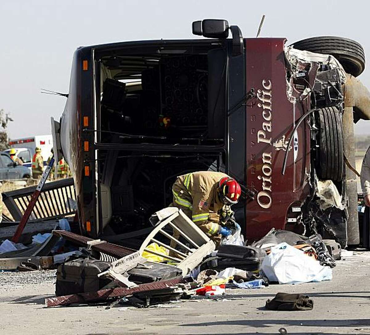 In this April 28, 2009 file photo, the scene of a multi-fatal accident involving a tour bus traveling south on Highway 101 near Soledad, Calif., is seen. Fatigue may have played a role in the bus crash last year that killed the vehicle's driver and four French tourists traveling through California on vacation, authorities said. (Monterey County herald, Vern Fisher)
