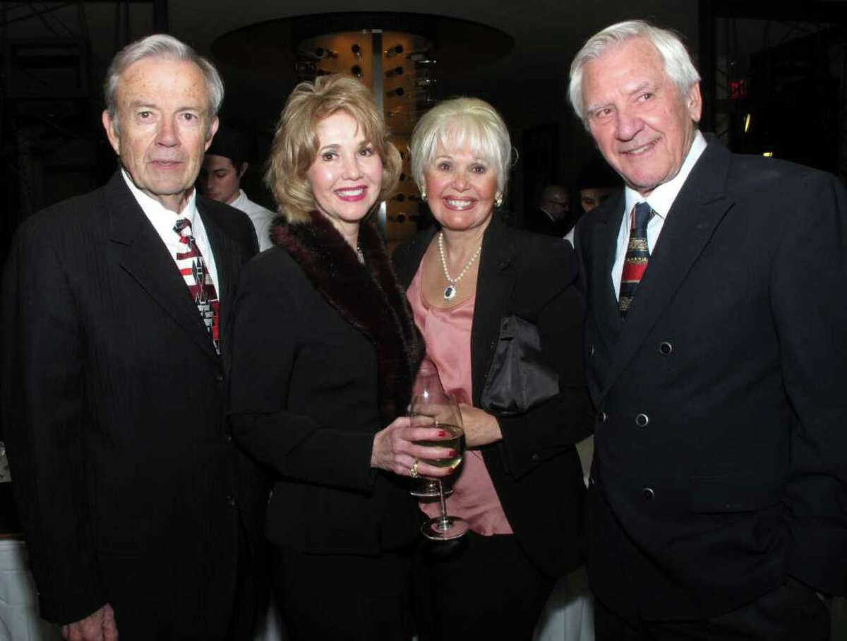 OTS/HEIDBRINK - Supporters and spouses, Harry Hooker, from left, Lucile Hooker, Yolanda Showalter and Howard Showalter mingle at the grand opening of Stephan Pyle's Signature Restaurant, Sustenio on 2/4/2012. This is #3 of 3 photos. names checked photo by leland a. outz