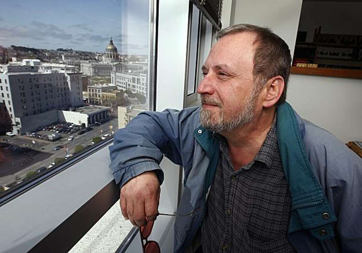 Ken Werner admires the view from his 17th floor studio apartment in the brand new Trinity Place residential building in San Francisco, Calif., on Wednesday, March 24, 2010. Werner was relocated to the new development and still pays$673 a month for rent.