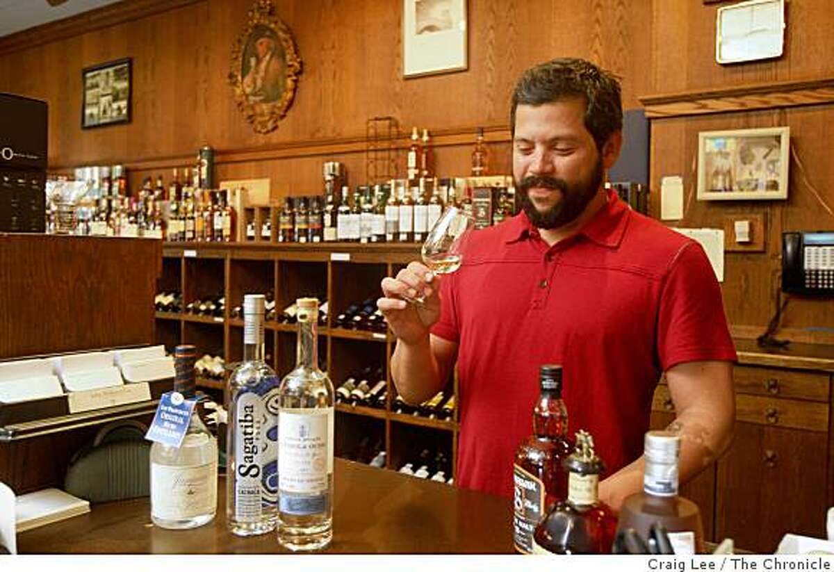 Dominic Venegas tasting some Tequila, working at John Walker and Co. in San Francisco, Calif., on September 15, 2008. Dominic is one of several local bartenders who are moving from working mixing drinks behind the bar to becoming brand ambassadors, bar consultants and sales representatives.