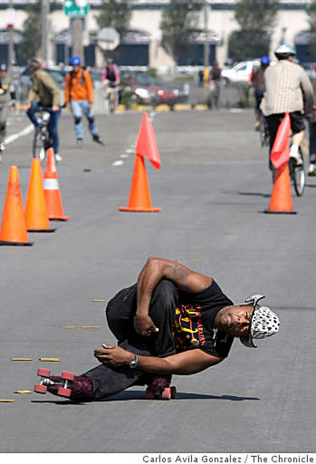 David Miles, Jr., skates on Terry A. Francois Street on Sunday, September 14, 2008, in San Francisco, Ca., during the city's Sunday Streets event. Sunday is the second and last time this year the city experiments with closing down parts of San Francisco to encourage people to get out and about. The city has partnered with more than 100 sponsors and dozens of free activities will be offered along the route.