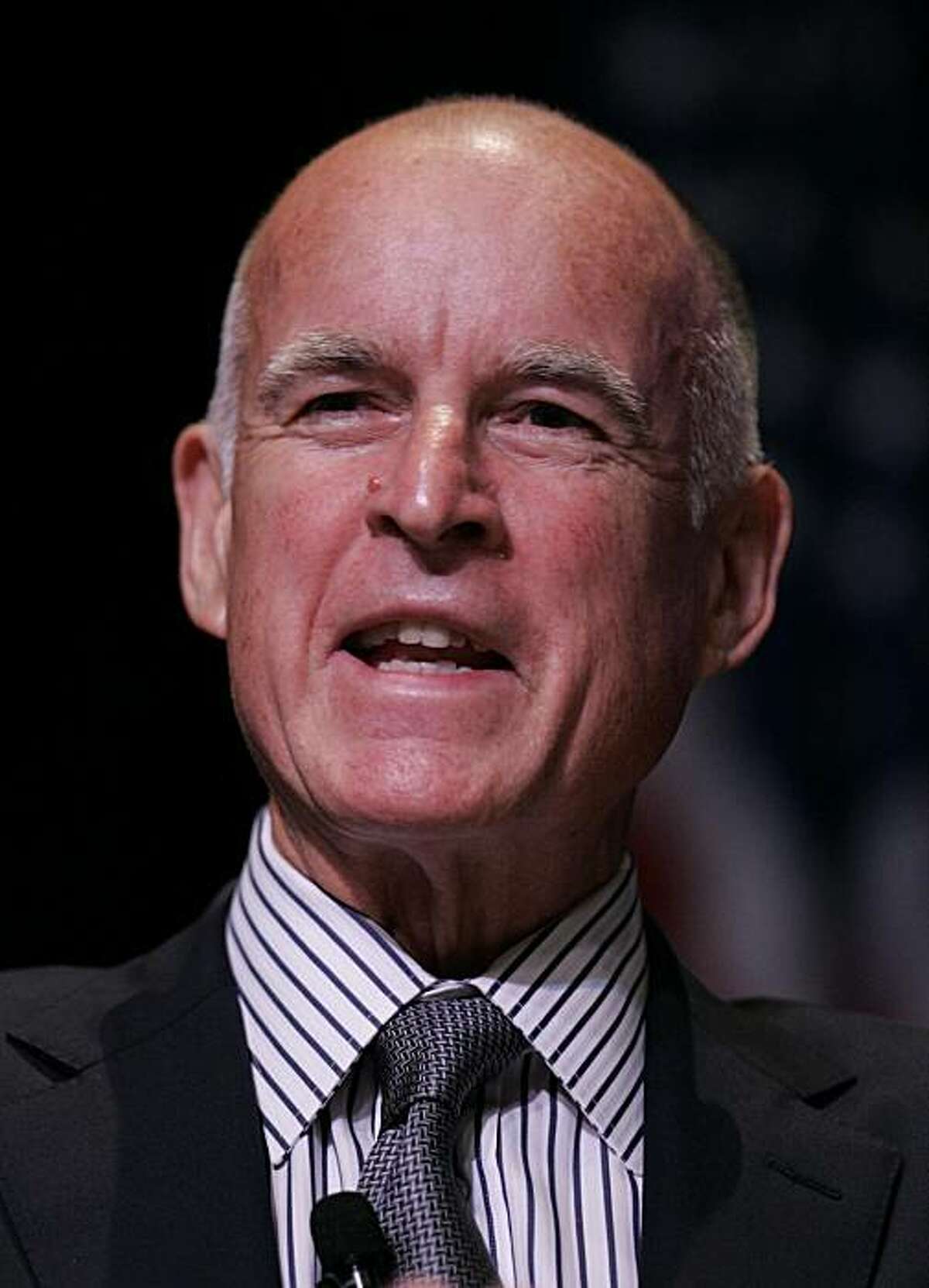 California Attorney General Jerry Brown, who is also running for Governor, smiles during panel discussion at Santa Clara University in Santa Clara, Calif., Wednesday, Sept. 16, 2009.