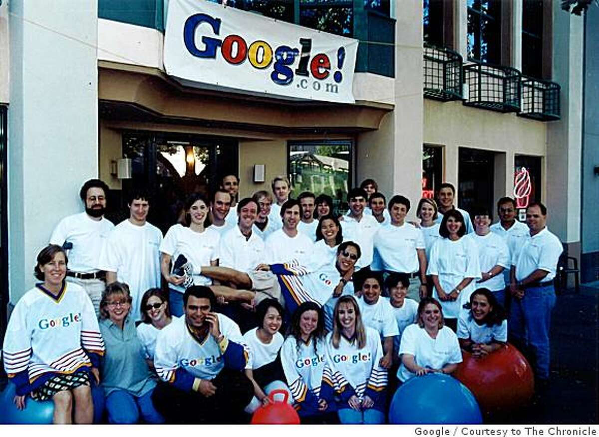 Google employees take a photo in front of their Palo Alto office the day they moved to their first Mountain View office in 1999.