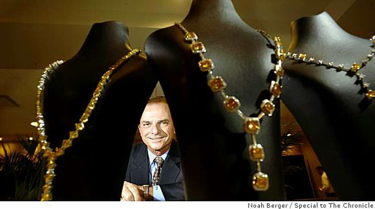 Steve Lux, CEO of Florida-based Gemesis Corporation, displays necklaces featuring lab-grown diamonds on Saturday, Aug. 23, 2008, in San Francisco.