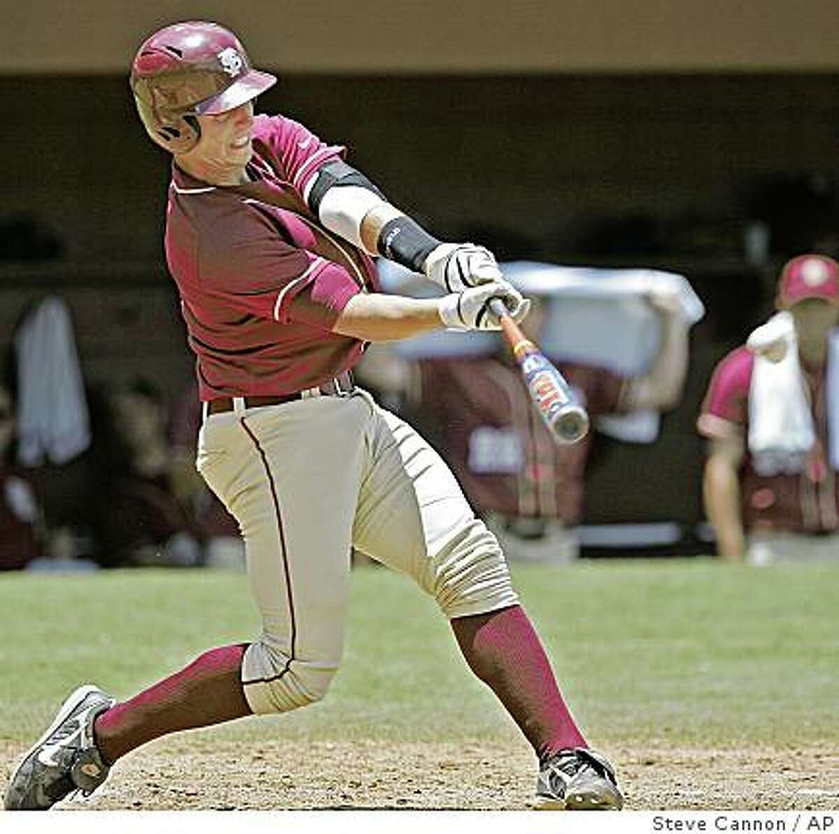 Florida State's Buster Posey connects for a grand slam in the third inning of a Tallahassee regional baseball game against Bucknell on Sunday, June 1, 2008 in Tallahassee, Fla. Florida State beat Bucknell 24-9.