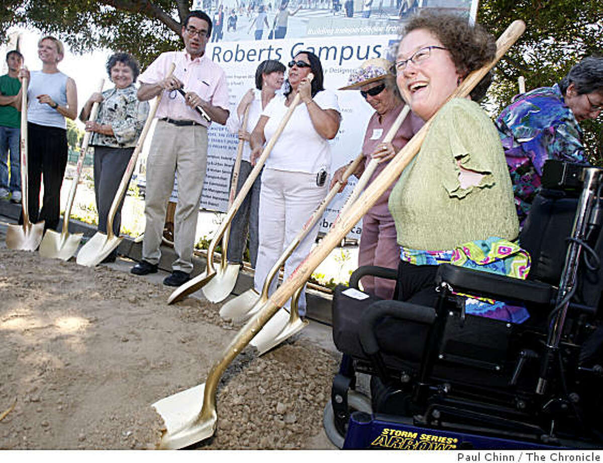 Jan Garrett (right), vice president of the Ed Roberts Campus, joined other dignitaries in the groundbreaking ceremony for the Ed Roberts Campus at the Ashby BART station in Berkeley, Calif., on Thursday, Sept. 4, 2008.
