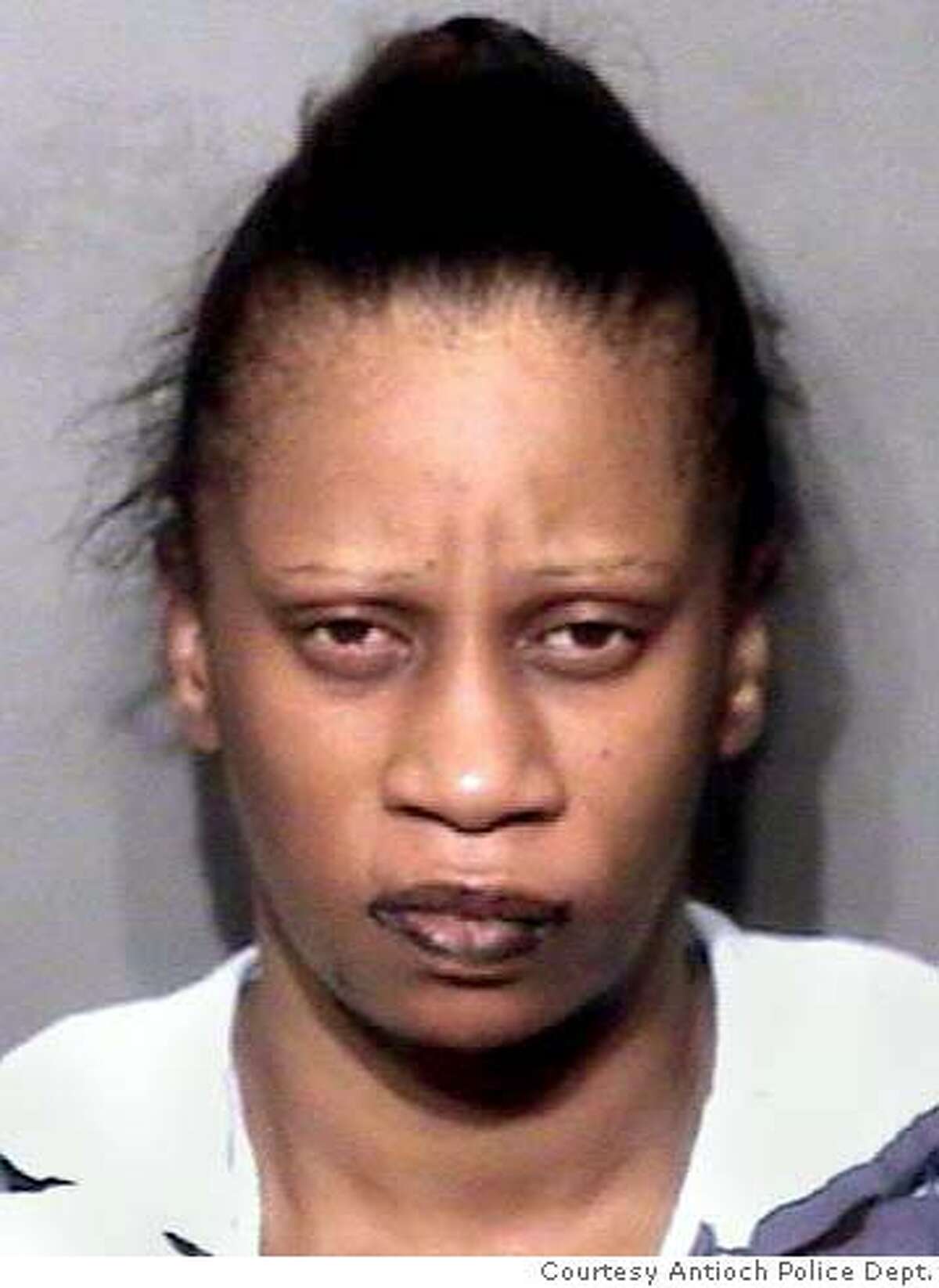 Shemeeka Davis was arrested Tuesday on suspicion of murder and child abuse in connection with the death of a 15-year-old girl who was under her care, police said. (Courtesy Antioch Police Dept.)