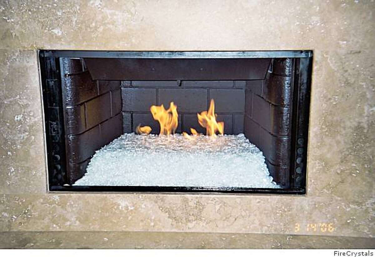 Glass fireplace inserts hot as wood but cleaner