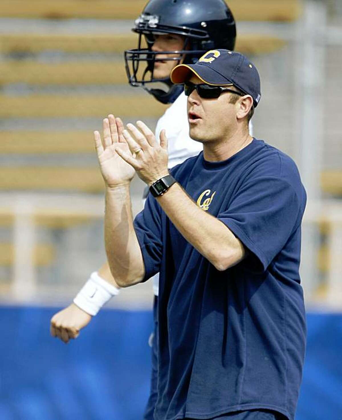 Cal football offensive coordinator Frank Cignetti works at a team practice at Memorial Stadium on the UC Berkeley (Calif.) campus on April 2, 2008. Quarterback Kevin Riley (13) Cal football quarterback Nate Longshore (6) Cal football defensive lineman Derrick Hill (76) Cal football wide receiver Michael Calvin (84) Cal football wide receiver Jeremy Ross (3) Cal football wide receiver Nyan Boateng (8) Cal football head coach coach Jeff Tedford Photo by Michael Maloney / San Francisco Chronicle