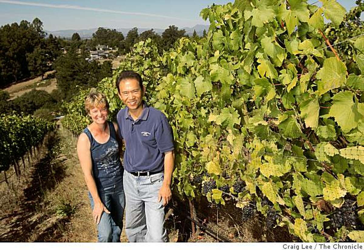 Tom and Rebecca Kisaichi next to their Pinot Noir vineyard, in Sebastopol, Calif., on August 25, 2008.