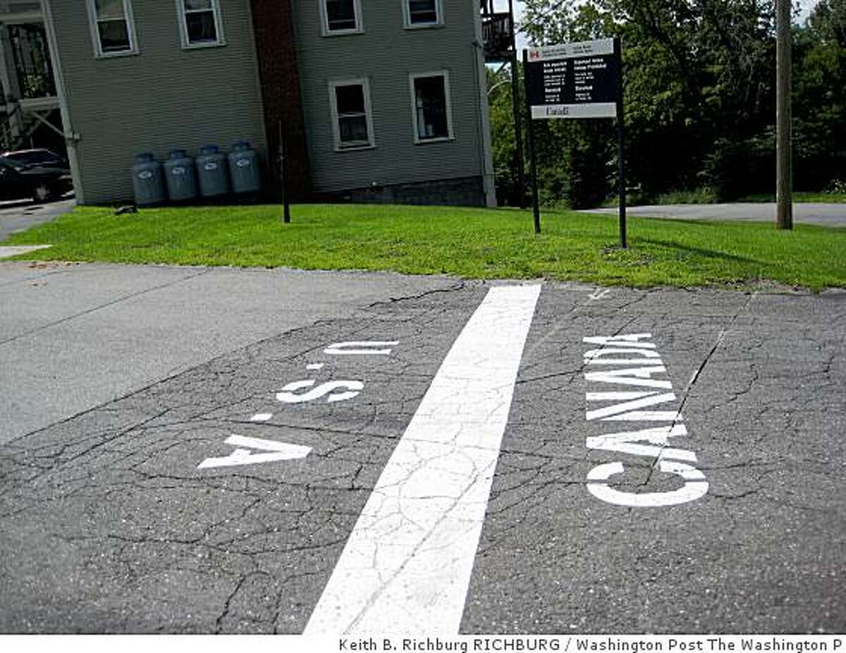 In Derby Line, Vt., the border between the United States and Canada is sometimes simply marked on the asphalt. Residents of this small Vermont town, along with their Canadian neighbors and friends, are having to adjust to more rigorous border enforcement. Illustrates BORDER (category a), by Keith B. Richburg (c) 2008, The Washington Post. Moved Saturday, Aug. 23, 2008. (MUST CREDIT: Washington Post photo by Keith B. Richburg.)In Derby Line, Vt., the border between the United States and Canada is sometimes simply marked on the asphalt. Residents of this small Vermont town, along with their Canadian neighbors and friends, are having to adjust to more rigorous border enforcement. Illustrates BORDER (category a), by Keith B. Richburg (c) 2008, The Washington Post. Moved Saturday, Aug. 23, 2008. (MUST CREDIT: Washington Post photo by Keith B. Richburg.)