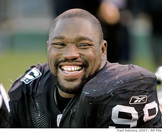 Oakland Raiders' Warren Sapp, #99, is all smiles after causing a fumble  against the San Diego Chargers in the 1st quarter of their game on Sunday,  December 29, 2007 at McAfee Coliseum