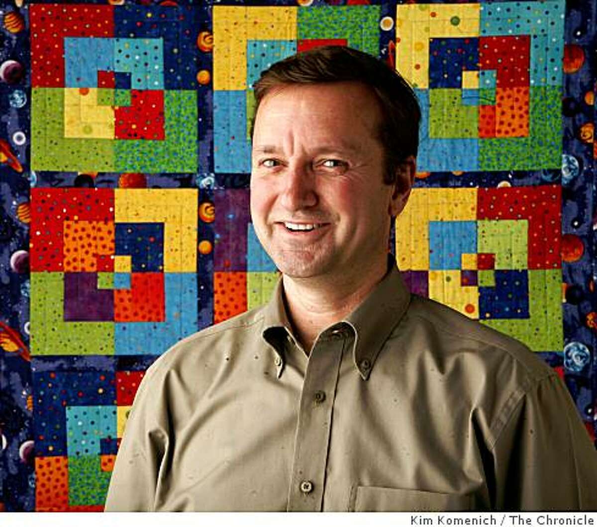 Jim Hahn of San Francisco, Calif., uses algebra to figure out how to proportionally up- and down-size the patterns in the quilts he makes. He is photographed with some of his creations in San Francisco on Wednesday, Aug. 20, 2008.