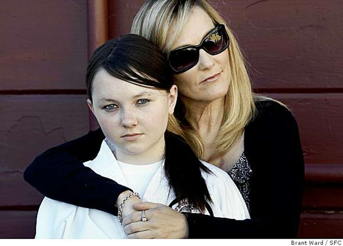 Olivia Gardner is a 14 year old student who was subjected to attack on the internet by former classmates. Recently she has joined a karate school called Ito's White Tiger in Novato to help her protect herself. {Brant Ward/San Francisco Chronicle}3/15/07