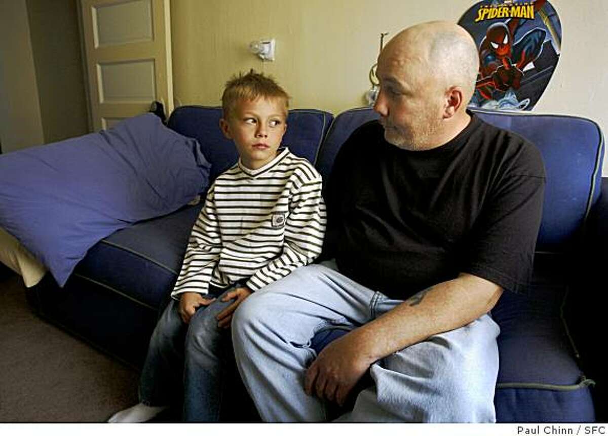 Seven-year-old Zachary Cataldo rests at home with his father Anthony in Oakland, Calif., on Wednesday, April 23, 2008. Anthony Cataldo is considering legal action after his complaints about his son being bullied at his school, Piedmont Elementary, were not addressed by school officials. Zachary spent Monday night at Children's Hospital after he was hit by an older classmate.Photo by Paul Chinn / San Francisco Chronicle