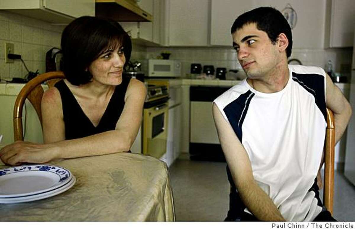 Asmik Karapetian and her son Arthur chat before lunch at home in Fresno, Calif., on Thursday, June 26, 2008. The Armenian family immigrated to the United States about 16 years ago and may be deported by Immigrations and Customs Enforcement if a bill introduced by Sen. Dianne Feinstein fails to pass.Photo by Paul Chinn / The Chronicle