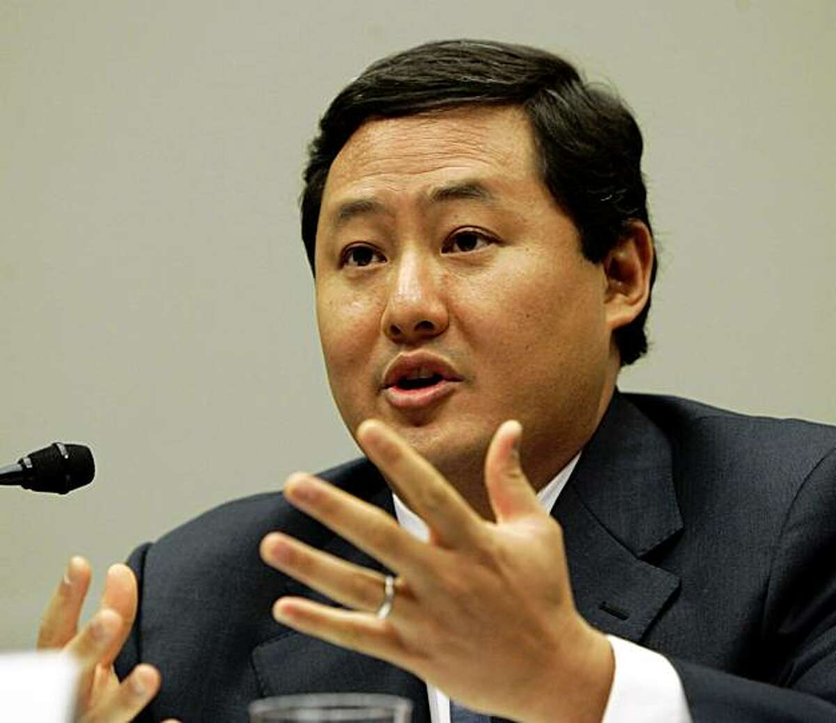 File - In this June 26, 2008 file photo John Yoo, a law professor at the University of California at Berkeley, testifies on Capitol Hill in Washington. Justice Department officials have stopped short of recommending criminal charges against Bush administration lawyers who wrote secret memos approving harsh interrogation techniques of terror suspects. (AP Photo/Susan Walsh, File)