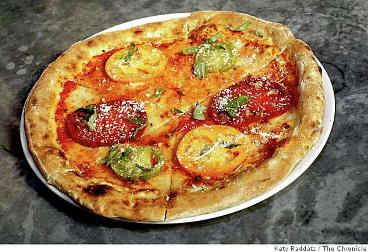 Heirloom tomato mozzarella di bufala, torn basil, and olive oil pizza, served at Garibaldis on College Ave. in Oakland, Calif. on Thursday, July 3, 2008.Photo by Katy Raddatz / The Chronicle