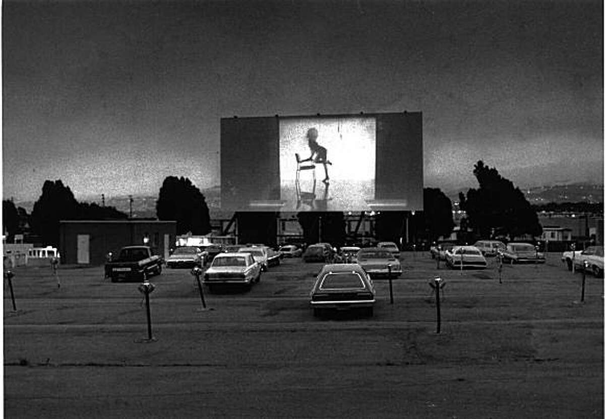 The Spruce Drive-In Theater in South San Francisco in 1983. Movie on screen is Flashdance.