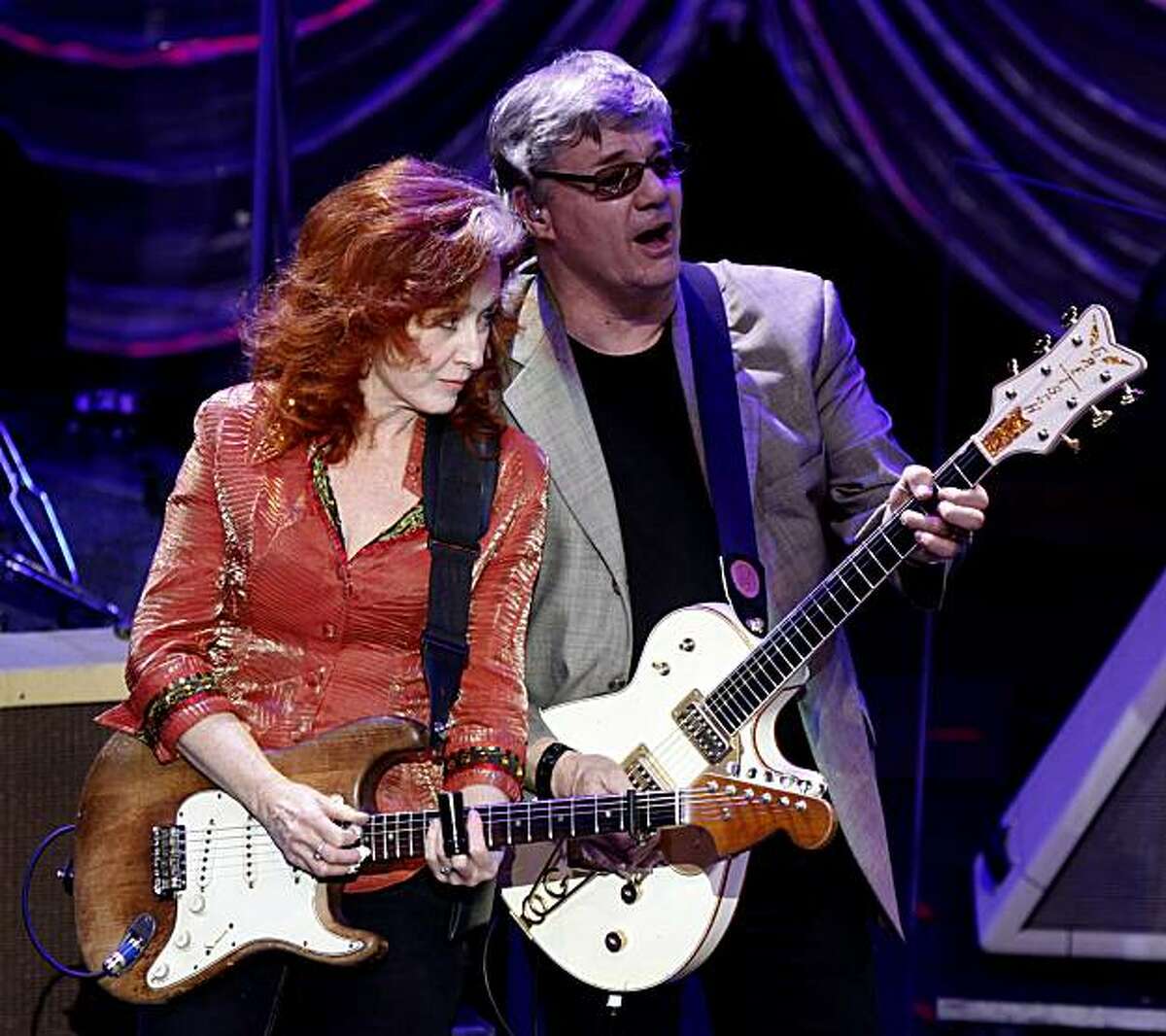Steve Miller from the Steve Miller Band performs with Bonnie Raitt at the Fox Theater in downtown Oakland during a tribute concert for the late Bay Area harmonic legend Norton Buffalo. By Lance Iversen/The Chronicle