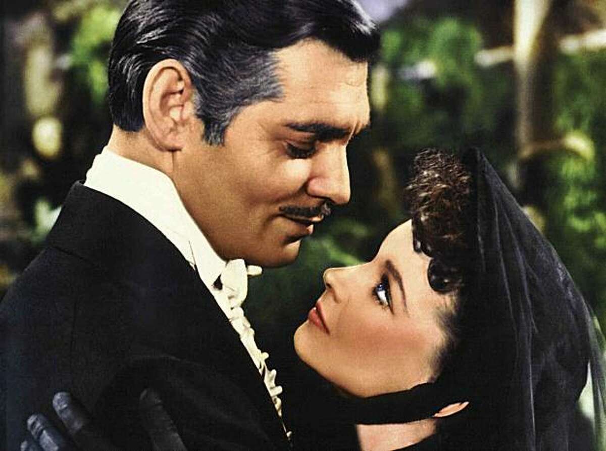 MOVIE, FILM "GONE WITH THE WIND' CAST INCLUDES: Clark Gable as Rhett Butler and Vivian Leigh as Scarlett O'Hare in "Gone With the Wind."