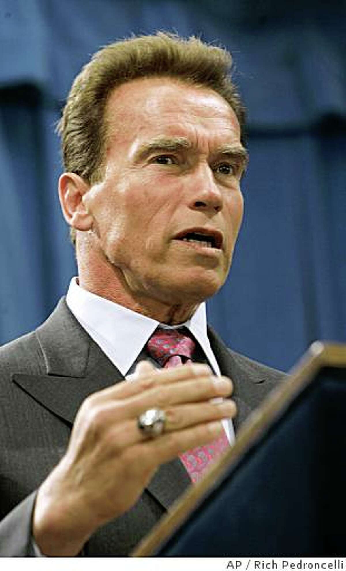 Gov. Arnold Schwarzenegger answers questions after declaring a statewide drought and signing an executive order directing the Department of Water Resources to help speed water transfers to areas with the worst shortages, during a news conference at the Capitol in Sacramento, Calif., Wednesday, June 4, 2008. Schwarzenegger made the drought declaration because the state has had two years of below-average rainfall, and low snow melt runoff.(AP Photo/Rich Pedroncelli)