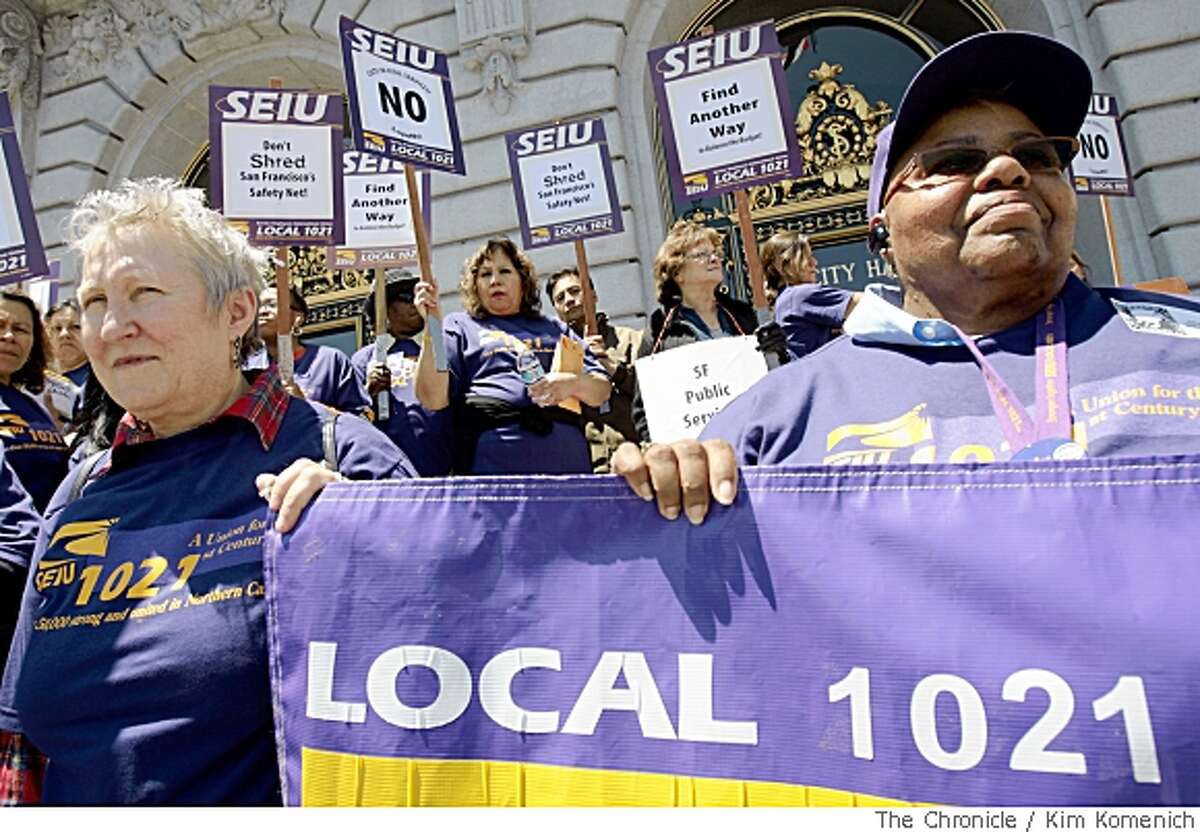 Union supporters Sally Buchmann, left, and Linda Martin of San Francisco General Hospital hold a banner as members of Service Employees International Union Local 1021 hold a rally on the steps of San Francisco City Hall on Thursday, May 22, 2008.Photo by Kim Komenich / San Francisco Chronicle