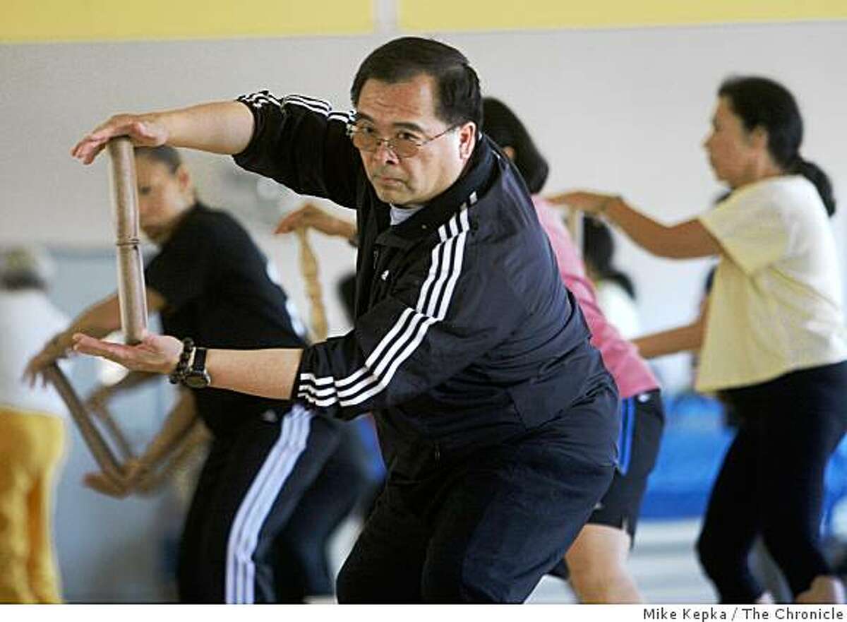 Bryant Fong, of San Francisco, teaches a Taiji class at the Buchanan YMCA on Thursday July 24, 2008 in San Francisco, Calif. Fong says he thinks politics and sports shouldn't mixed and the Olympics should be strictly meant for the Athletes who have work to get to the top of their game. Photo by Mike Kepka / The Chronicle