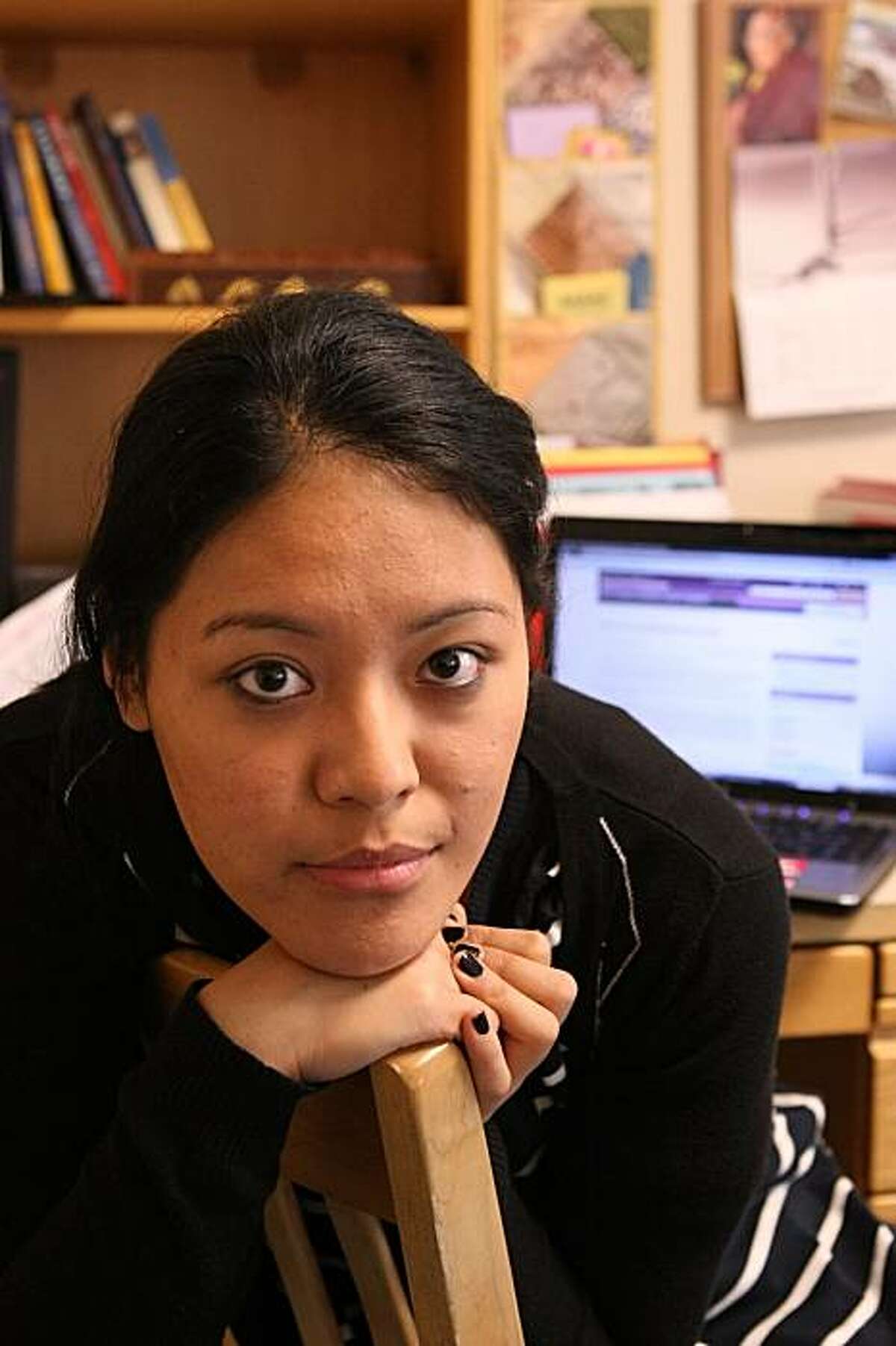 Tenzin Seldon, 20, a student at Stanford University and activist for a free Tibet, sits in her dorm room Friday, January 15, 2010. Seldon's Gmail account was recently hacked in the flurry of cyber attacks against advocates of human rights that originated in China late last year and prompted Google to threaten to leave the country.
