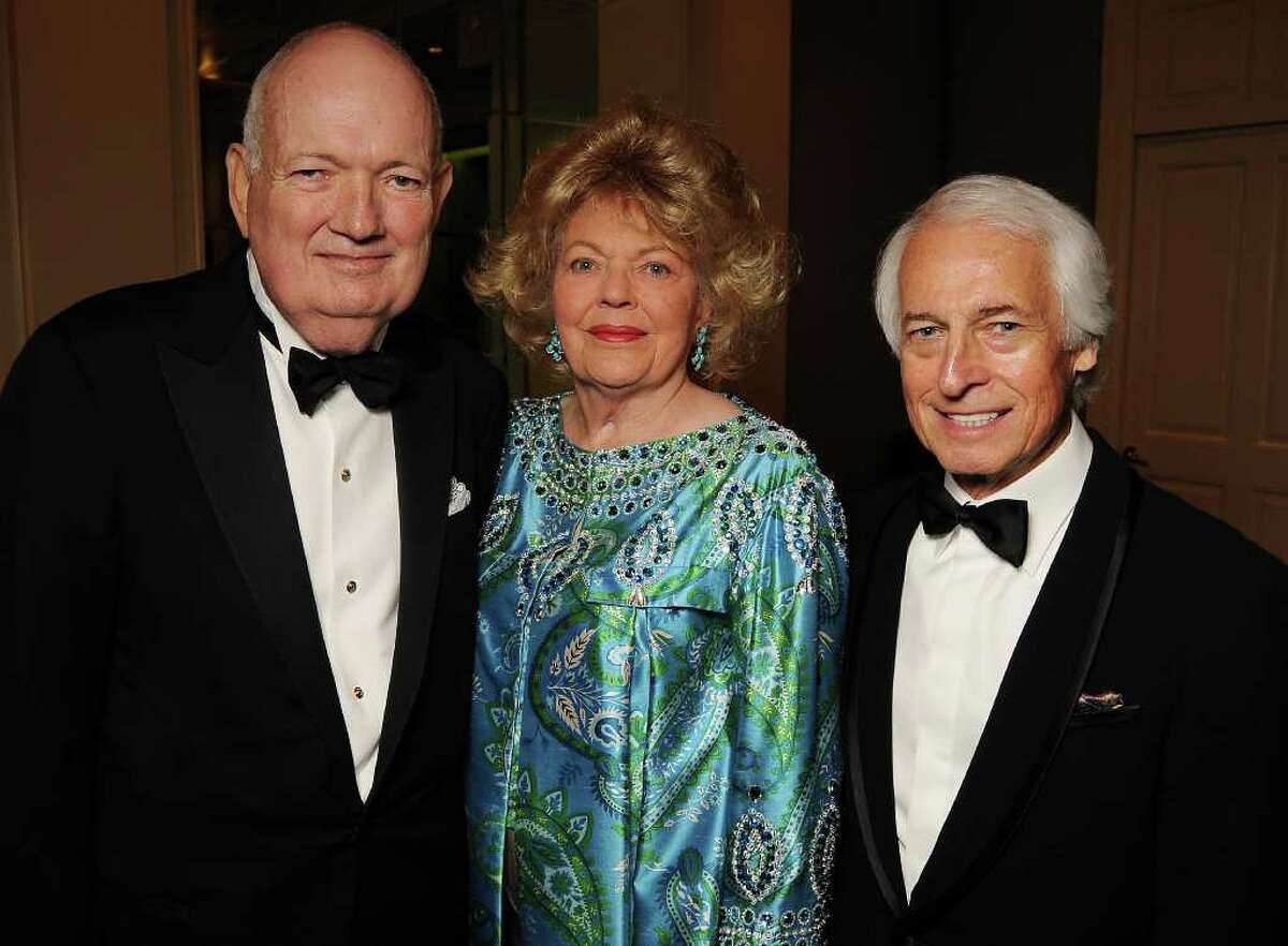 Chair Jackson Hicks, left, with honorees Bobbie-Vee and Jerry Cooney