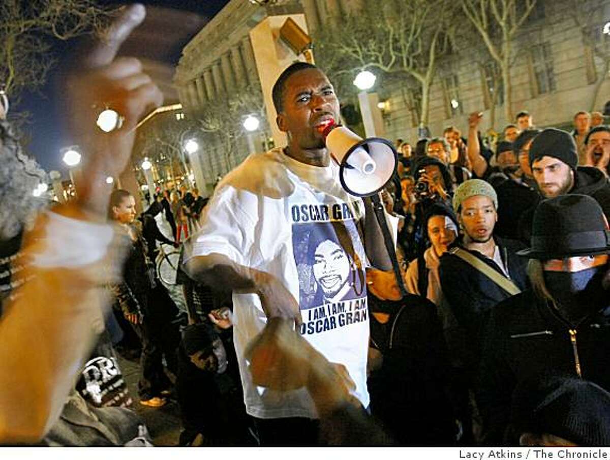 Kevin Epps lead the crowd of protesters in a chant over the killing of Oscar Grant rally at BART's Civic Center, Monday Jan. 12, 2009, in San Francisco, Calif.