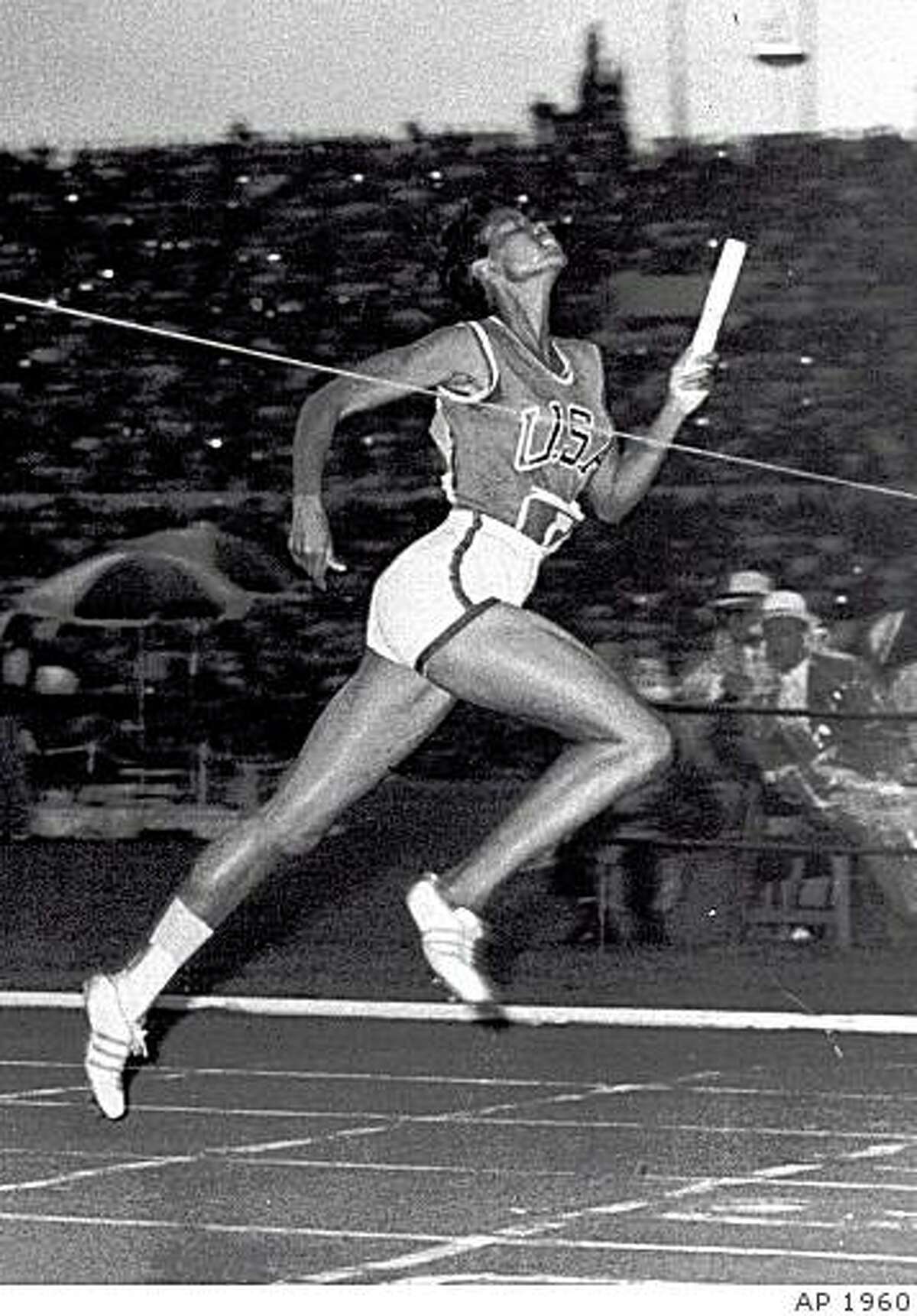 ADVANCE FOR WEEKEND JUNE 22-23--FILE--Wilma Rudolph, 20, hits the tape to win the 400 meter relay for the US at the 1960 Summer Olympics in Rome. (AP Photo/file)