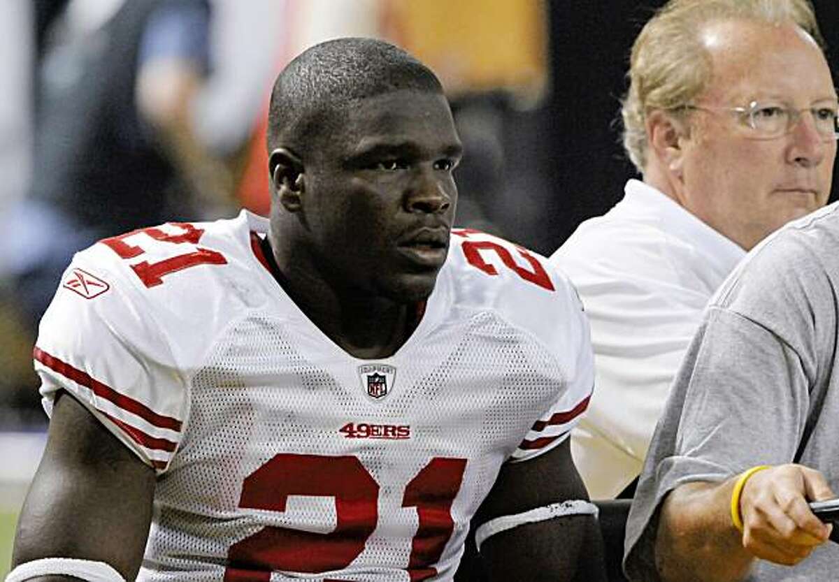 San Francisco 49ers running back Frank Gore is driven off the field in a cart in the first quarter of an NFL football game against the Minnesota Vikings, Sunday, Sept. 27, 2009m in Minneapolis. (AP Photo/Jim Mone)