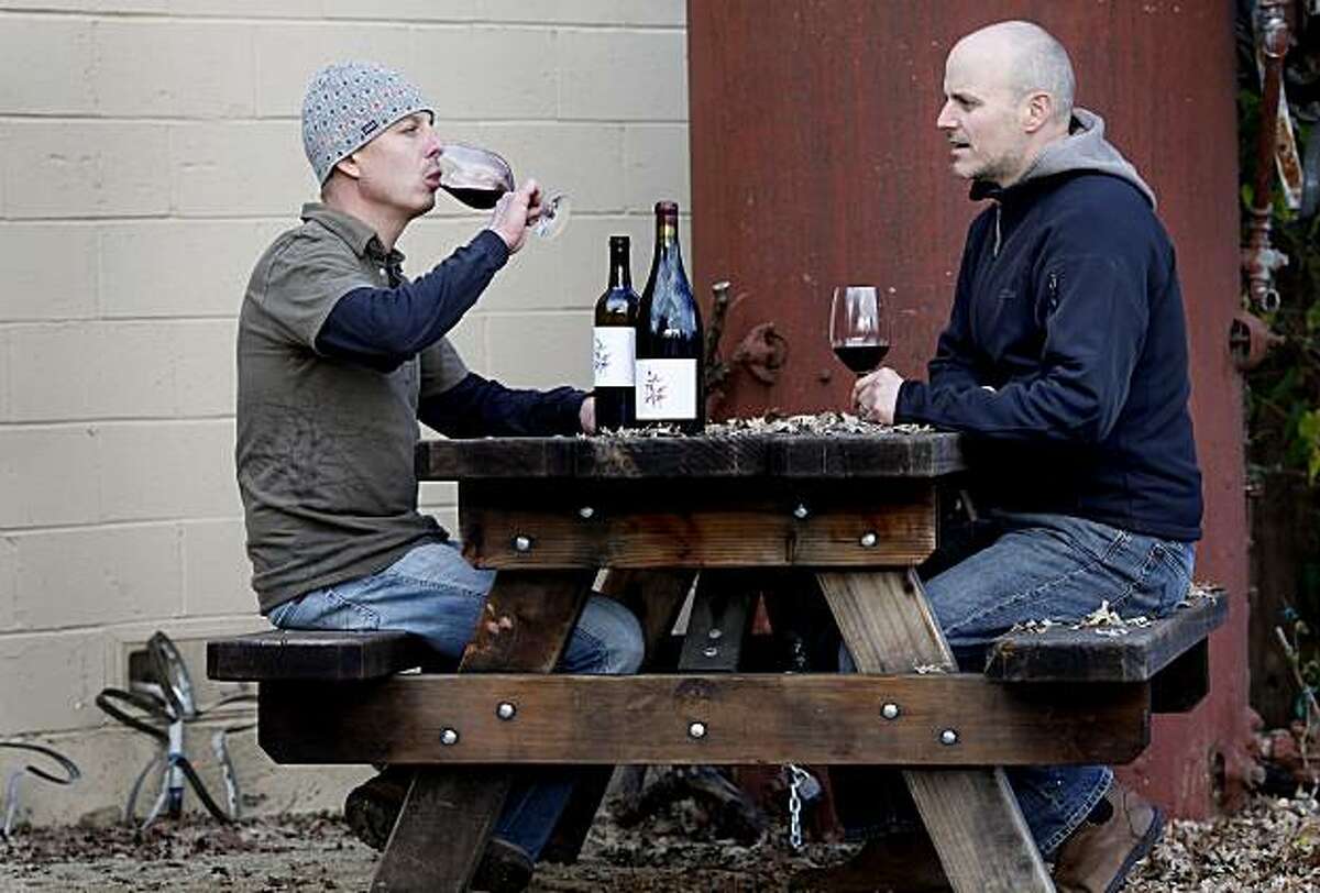 Meyers (left) and Arnot enjoy a tasting just outside their facility. Duncan Arnot Meyers and Nathan Lee Roberts of Arnot-Roberts in Forestville have been friends since childhood.