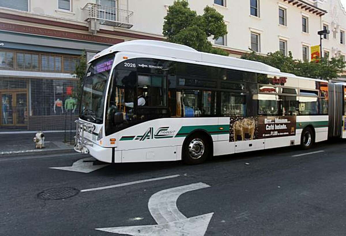 An AC Transit bus rolls down Telegraph Avenue in Berkeley, Calif., on Saturday, July 5, 2008.