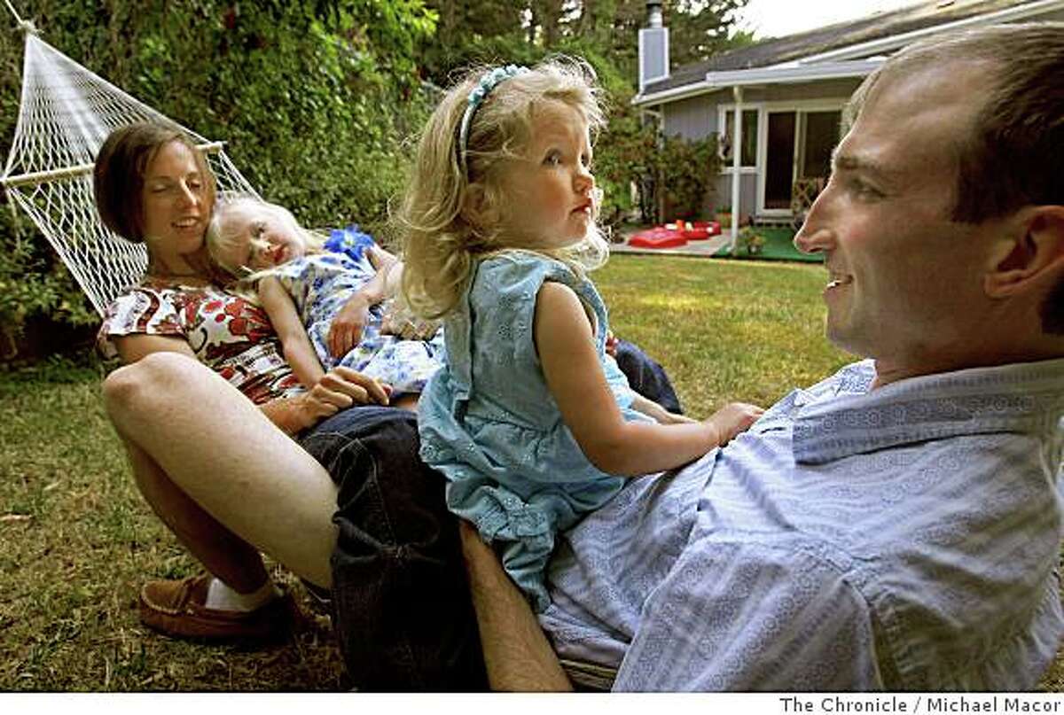 Mike and Sarah Northrop at their Pacifica, Calif. home with their daughters Sylvanna, 4, with mom, and Nerea, 2, with dad, on June 13, 2008. After renting a home in San Francisco for seven years the family moved to Pacifica because they couldn't find a home they could afford to buy with enough room for the four of them.Photo By Michael Macor/ The Chronicle