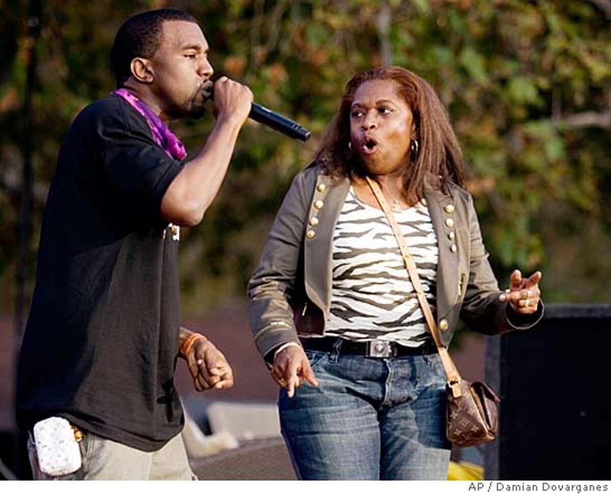 **FILE**Singer Kanye West performs with his mother, Donda West, outdoors during a taping of "The Ellen DeGeneres Show," in this May, 2006 file photo, in Burbank, Calif. A spokesman for West said Donda West died Saturday night in Los Angeles. (AP Photo/Damian Dovarganes, file) Ran on: 11-12-2007 Donda West appears with her son, Kanye West, on The Ellen DeGeneres Show in May 2006. She was chief executive of the rappers business enterprises. A MAY 2006, FILE PHOTO