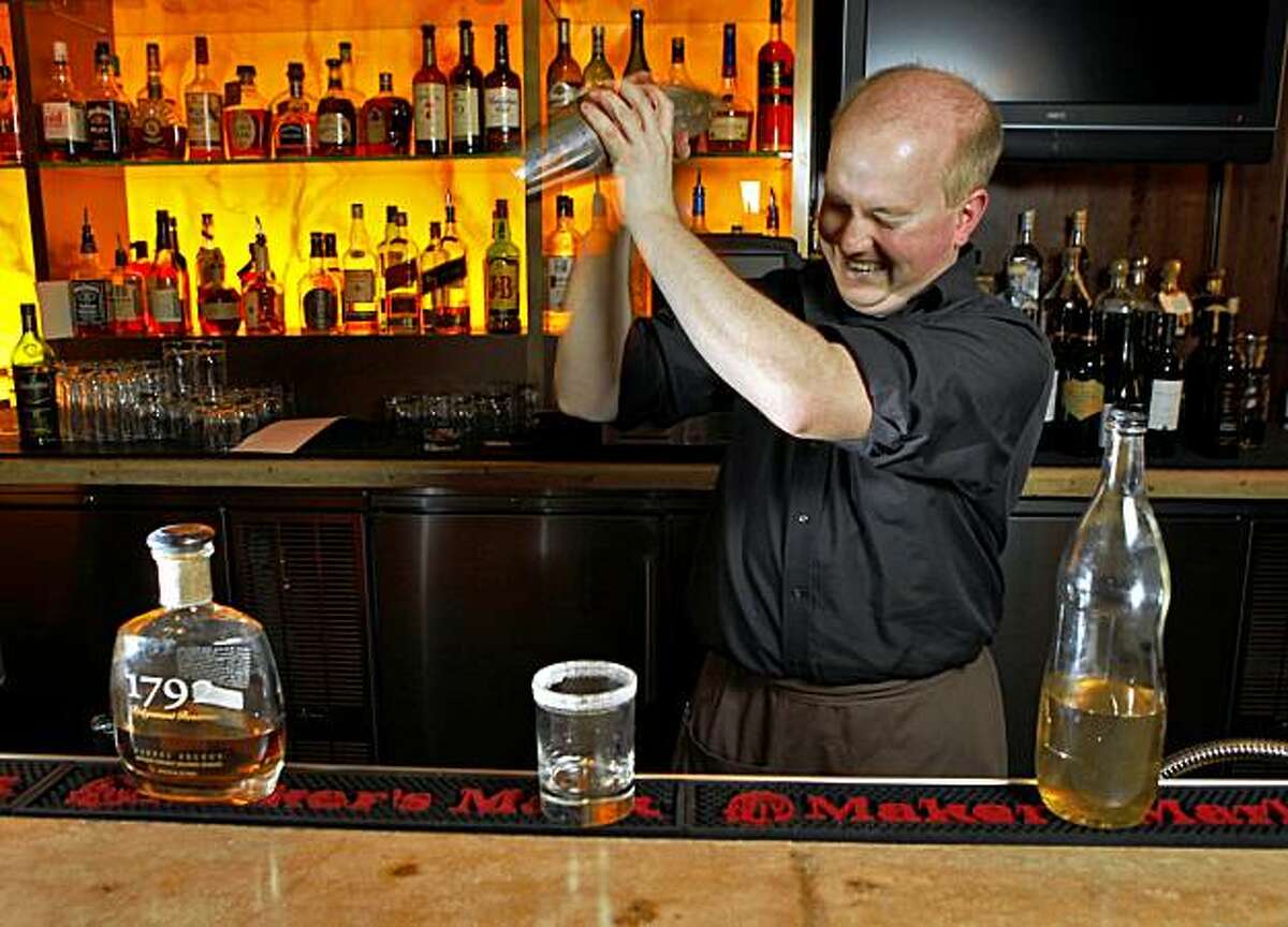 Josh Perry, bar manager of the Pican restaurant, makes a Kentucky Rebel made of Ridgemont 1792 Bourbon, Wednesday Nov. 18, 2009, in Oakland, Calif.