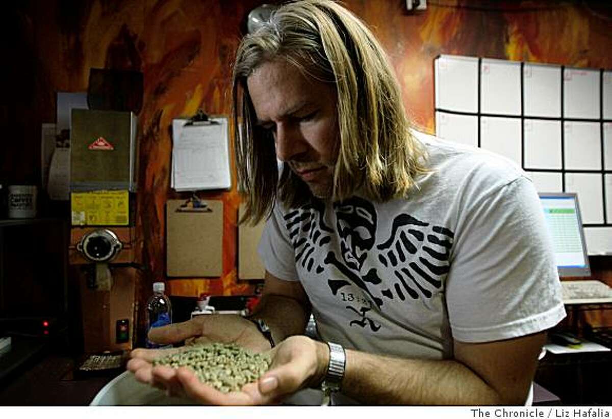 Chief espresso officer Andy Newbom inspects some coffee beans at Barefoot Coffee located at 5237 Stevens Creek Blvd. in Santa Clara, Calif., on Monday, June 2, 2008. Barefoot Coffee was voted one of the favorite coffee roasters from our readers.Photo by Liz Hafalia/The Chronicle