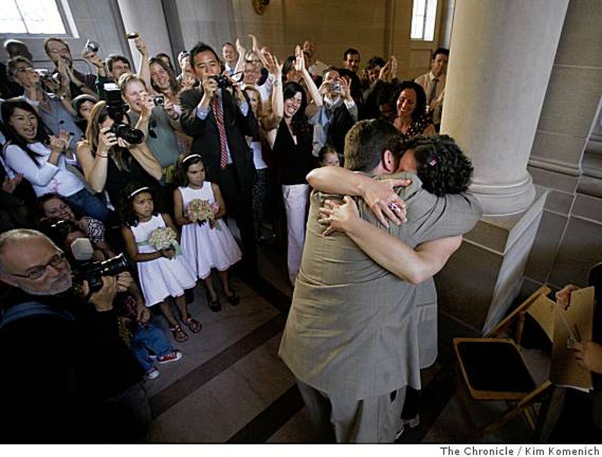 Eager couples flock to county clerks' offices