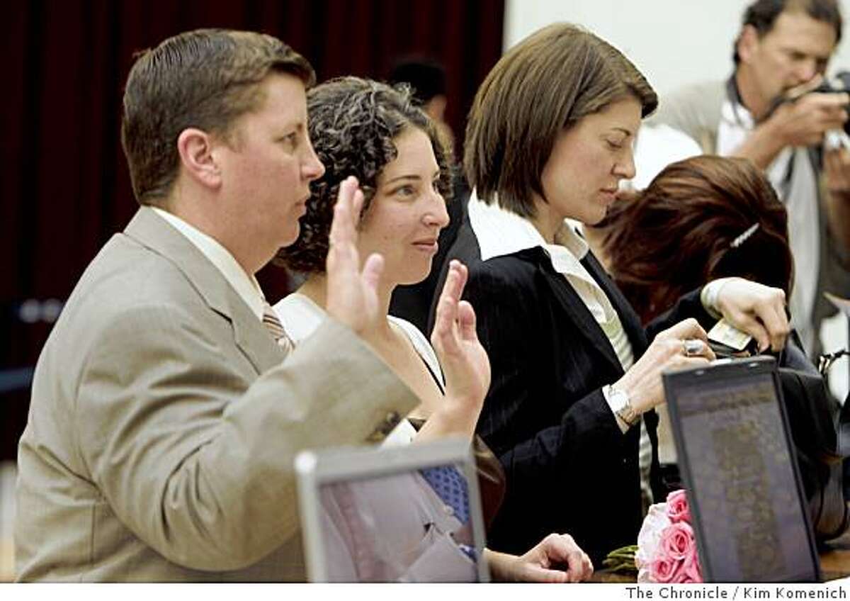 Eager couples flock to county clerks' offices