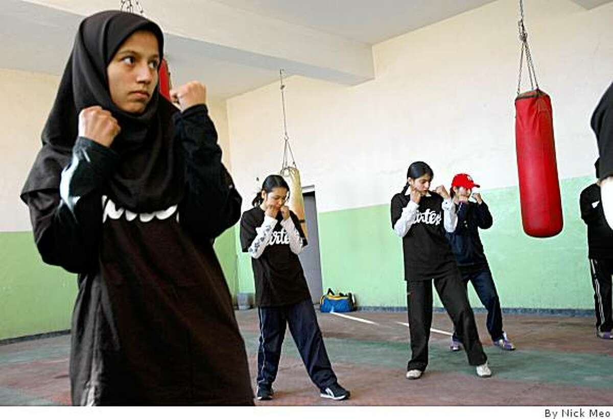 Afghan women train at the National Stadium in Kabul