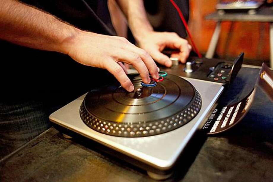 DJ Hero's turntable puts new spin on scratching SFGate