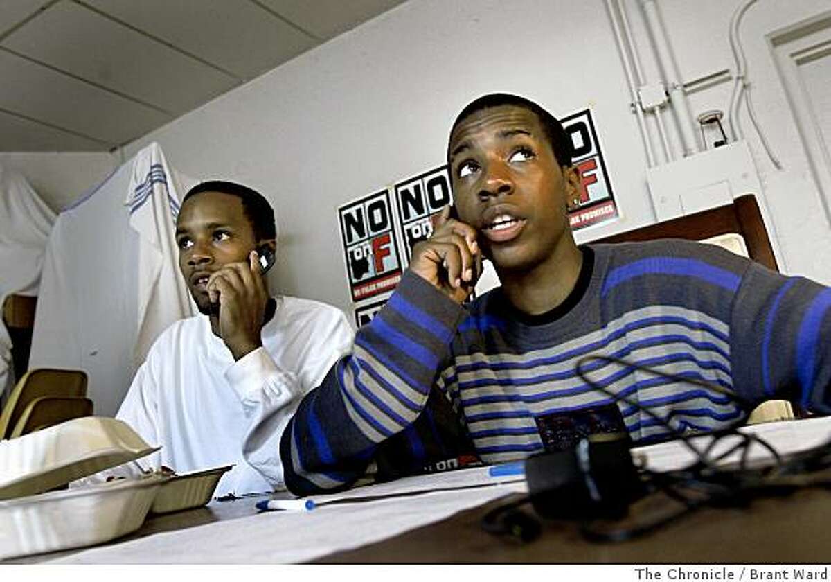 Brothers Brandon, left, and Jamal Jackson worked the phones to urging a yes vote on G and a no vote on F at a headquarters on Fillmore Street. Supporters of San Francisco, Calif. Propositions G and F worked Tuesday, June 3, 2008 to get out the vote. By Brant Ward / The Chronicle